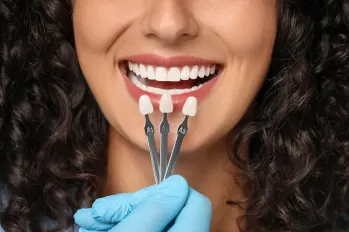 The doctor chooses veneers for the patient's teeth